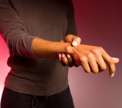 Woman holding Wrist